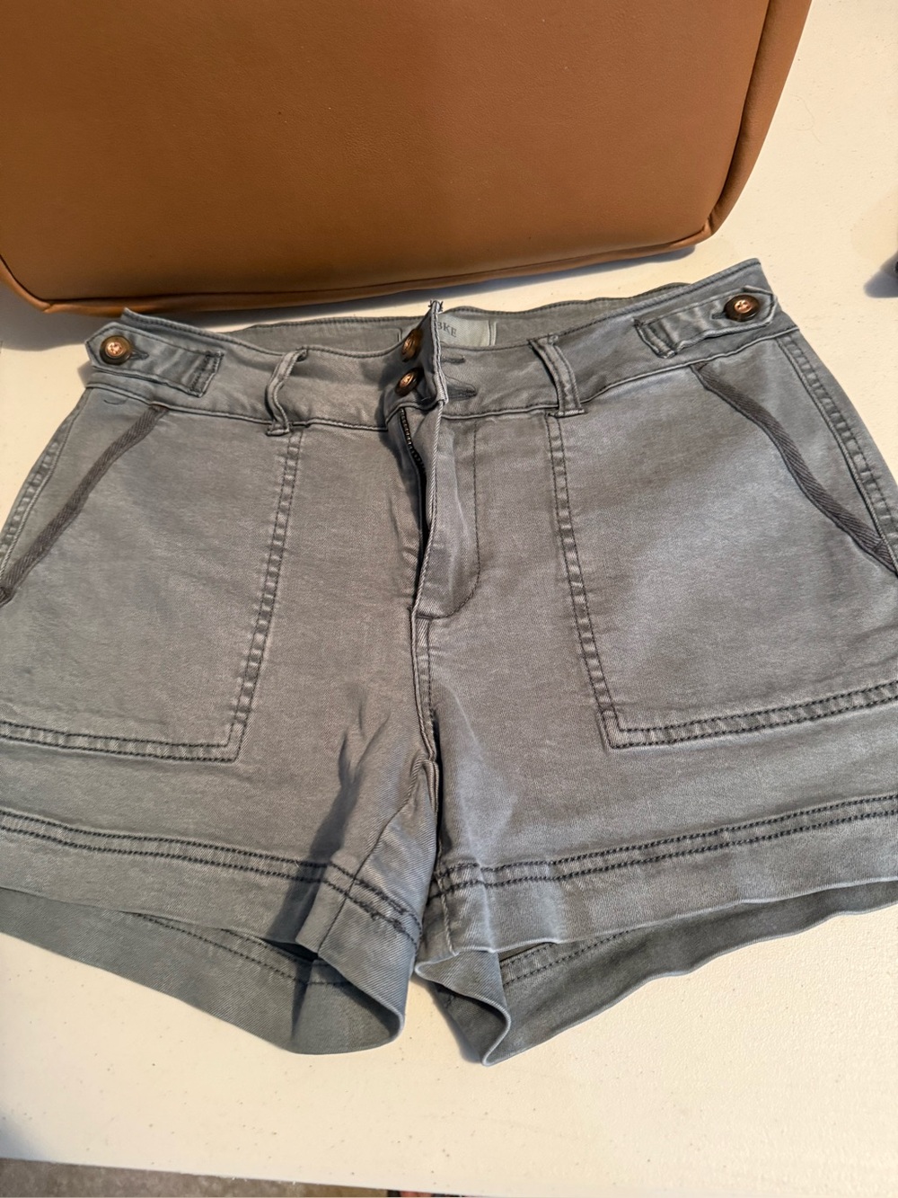 BKE utility/cargo-style shorts, size 26, in a washed gray/charcoal color.